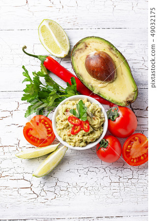Traditional Mexican avocado sauce guacamole Traditional Mexican avocado sauce guacamole 49032175