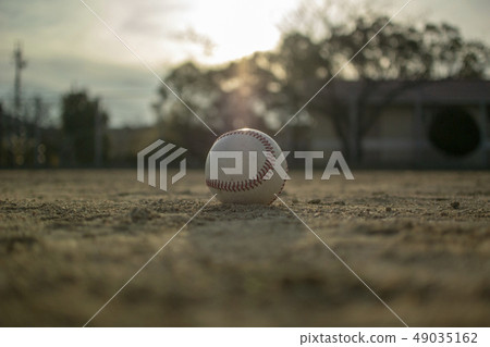 A ball that shines in the sunset 49035162