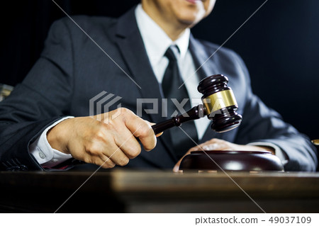 justice and law concept.Male judge in a courtroom 49037109