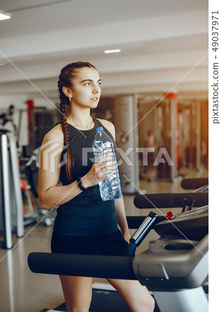 girl in a gym girl in a gym 49037971