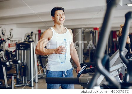 man in a gym man in a gym 49037972