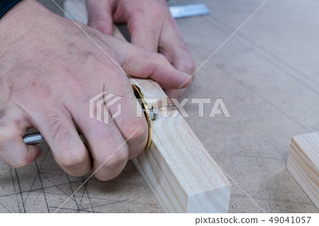 Carpenters produce various electric tools, handmade woodwork, indoor interior work Carpenters produce various electric tools, handmade woodwork, indoor interior work 49041057