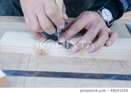 Carpenters produce various electric tools, handmade woodwork, indoor interior work 49041059