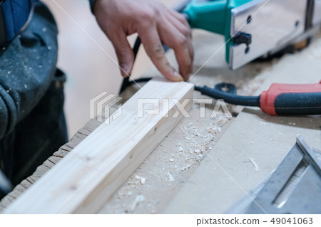 Carpenters produce various electric tools, handmade woodwork, indoor interior work Carpenters produce various electric tools, handmade woodwork, indoor interior work 49041063