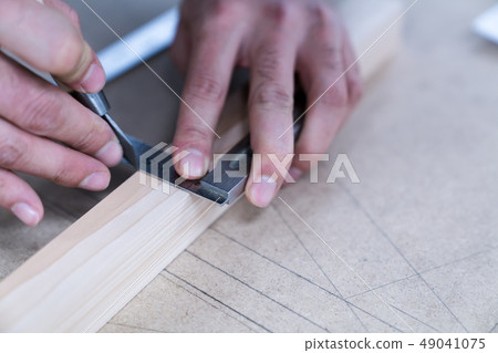 Carpenters produce various electric tools, handmade woodwork, indoor interior work 49041075
