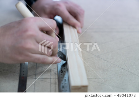 Carpenters produce various electric tools, handmade woodwork, indoor interior work 49041078