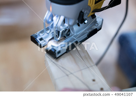 Carpenters produce various electric tools, handmade woodwork, indoor interior work Carpenters produce various electric tools, handmade woodwork, indoor interior work 49041107