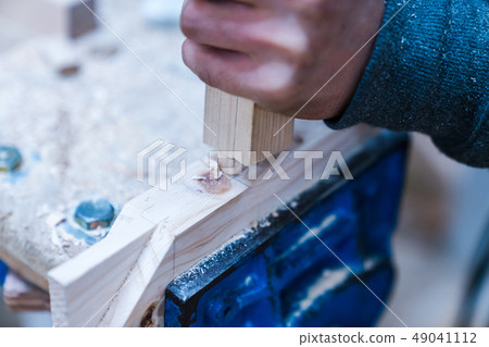 Carpenters produce various electric tools, handmade woodwork, indoor interior work Carpenters produce various electric tools, handmade woodwork, indoor interior work 49041112