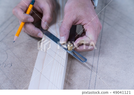 Carpenters produce various electric tools, handmade woodwork, indoor interior work 49041121
