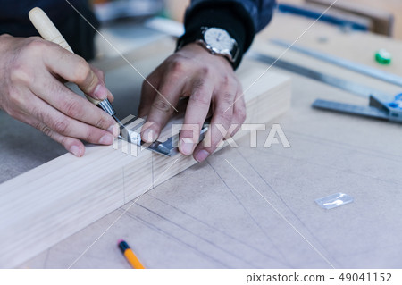 Carpenters produce various electric tools, handmade woodwork, indoor interior work Carpenters produce various electric tools, handmade woodwork, indoor interior work 49041152