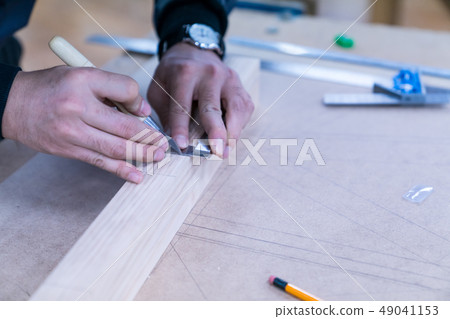 Carpenters produce various electric tools, handmade woodwork, indoor interior work 49041153