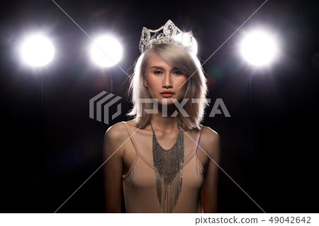 Fashion Asian Woman dark smoke back rim light 49042642