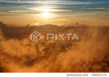 Sunset and Shining Sea of Japan viewed from the Bohai Shindo and Inukadake Pass Line 49043178