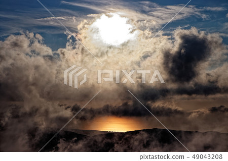 Sunset and Shining Sea of Japan viewed from the Bohai Shindo and Inukadake Pass Line 49043208