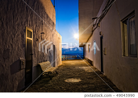 Alley in fishermen village in Fuerteventura at dusk 49043990