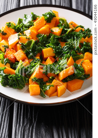 Fried vegetarian yam with kale cabbage close-up 49044166