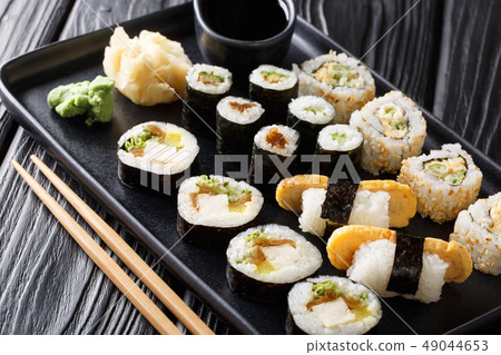 Delicious Japanese sushi rolls big set close-up Delicious Japanese sushi rolls big set close-up 49044653