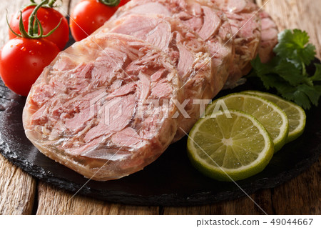 Turkey brawn served with fresh tomatoes, lime 49044667