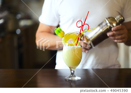 Pina Colada. Yellow alcohol cocktail with Pina Colada. Yellow alcohol cocktail with 49045390
