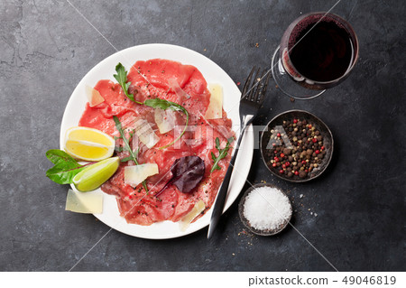 Marbled beef carpaccio and red wine 49046819