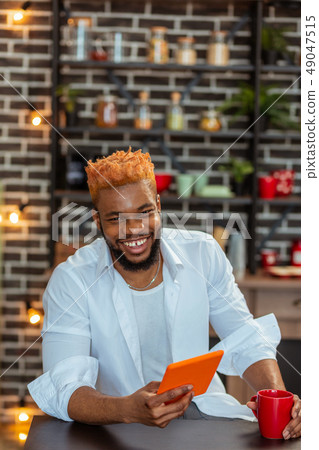 Positive delighted man being in a great mood Positive delighted man being in a great mood 49047515
