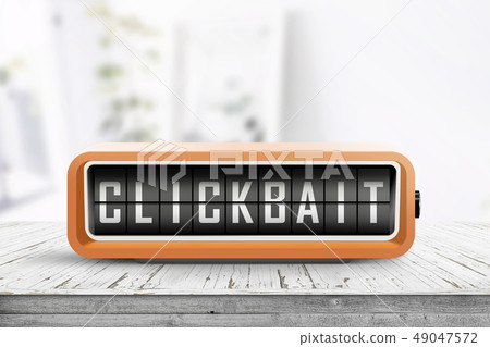 Clickbait text on a digital device in orange color Clickbait text on a digital device in orange color 49047572