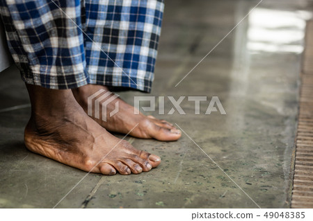 Feet of a nice African American man touching the floor 49048385