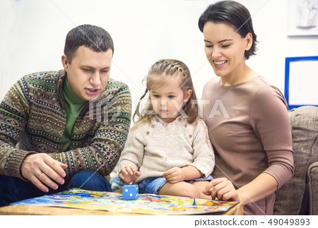 Portrait of happy family with little daughter 49049893