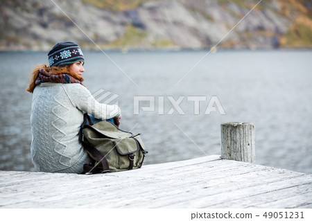Woman traveler with a backpack  49051231