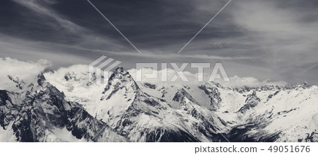 Panorama of snowy winter mountain in sunlight Panorama of snowy winter mountain in sunlight 49051676