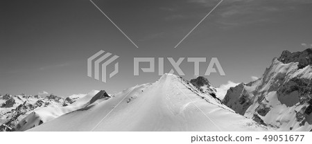 Black and white panorama of snowy mountains Black and white panorama of snowy mountains 49051677