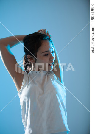 Young woman sweating at yoga Young woman sweating at yoga 49051998