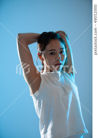 Young woman sweating at yoga Young woman sweating at yoga 49052000