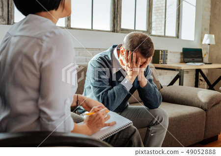 Desperate adult man being in panic with his mental issues 49052888