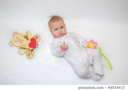beautiful baby eyes lies on white background beautiful baby eyes lies on white background 49054415