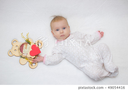 beautiful baby eyes lies on white background beautiful baby eyes lies on white background 49054416