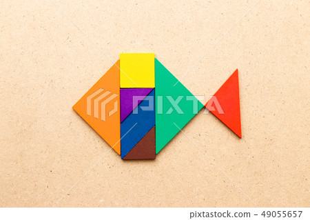 Color tangram puzzle in swimming fish shape 49055657