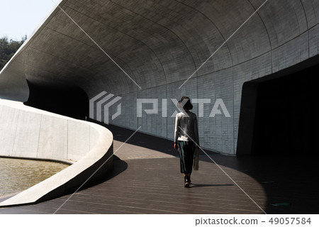 traveling woman walk at Xiangshan Visitor Center traveling woman walk at Xiangshan Visitor Center 49057584