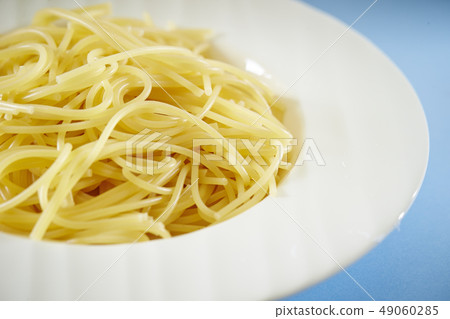Pasta noodle blue background Pasta noodle blue background 49060285