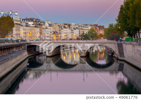 Paris. City embankment at sunrise. 49061776