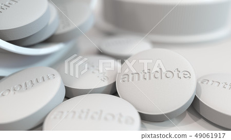 Close-up shot of pills with stamped ANTIDOTE text on them. 3D rendering Close-up shot of pills with stamped ANTIDOTE text on them. 3D rendering 49061917