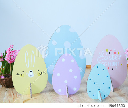 Cardboard Colorful Easter eggs background. Eco decorations. Cardboard Colorful Easter eggs background. Eco decorations. 49063860