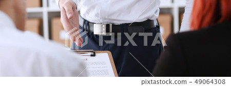 Male arm in shirt offer contract form on clipboard Male arm in shirt offer contract form on clipboard 49064308