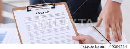 Male arm in shirt offer contract form on clipboard Male arm in shirt offer contract form on clipboard 49064314