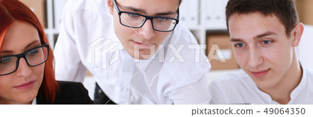 Group people sit in office deliberate on problem Group people sit in office deliberate on problem 49064350