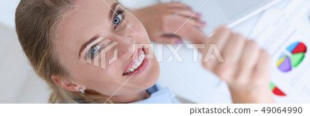 Female arm show ok or approval with thumb up Female arm show ok or approval with thumb up 49064990