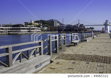 Yamaguchi Shimonoseki Kanmon Strait Kanmon Bridge and Karato Market Karato Pier Breakwater Red and white lovers lighthouse 49065322