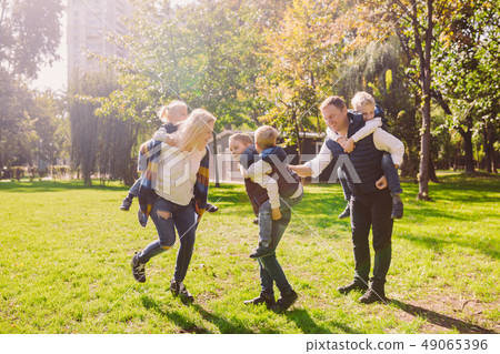 Theme family active leisure outside in nature. large Caucasian family with four children. Mom and 49065396