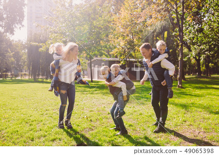 Theme family active leisure outside in nature. large Caucasian family with four children. Mom and Theme family active leisure outside in nature. large Caucasian family with four children. Mom and 49065398