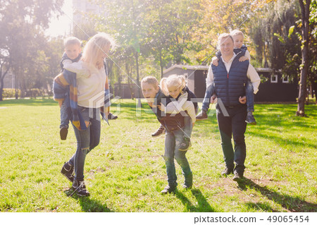 Theme family active leisure outside in nature. large Caucasian family with four children. Mom and Theme family active leisure outside in nature. large Caucasian family with four children. Mom and 49065454